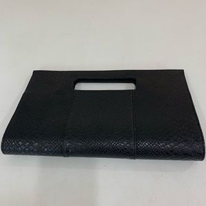 Charming Charlie black clutch. Used once!